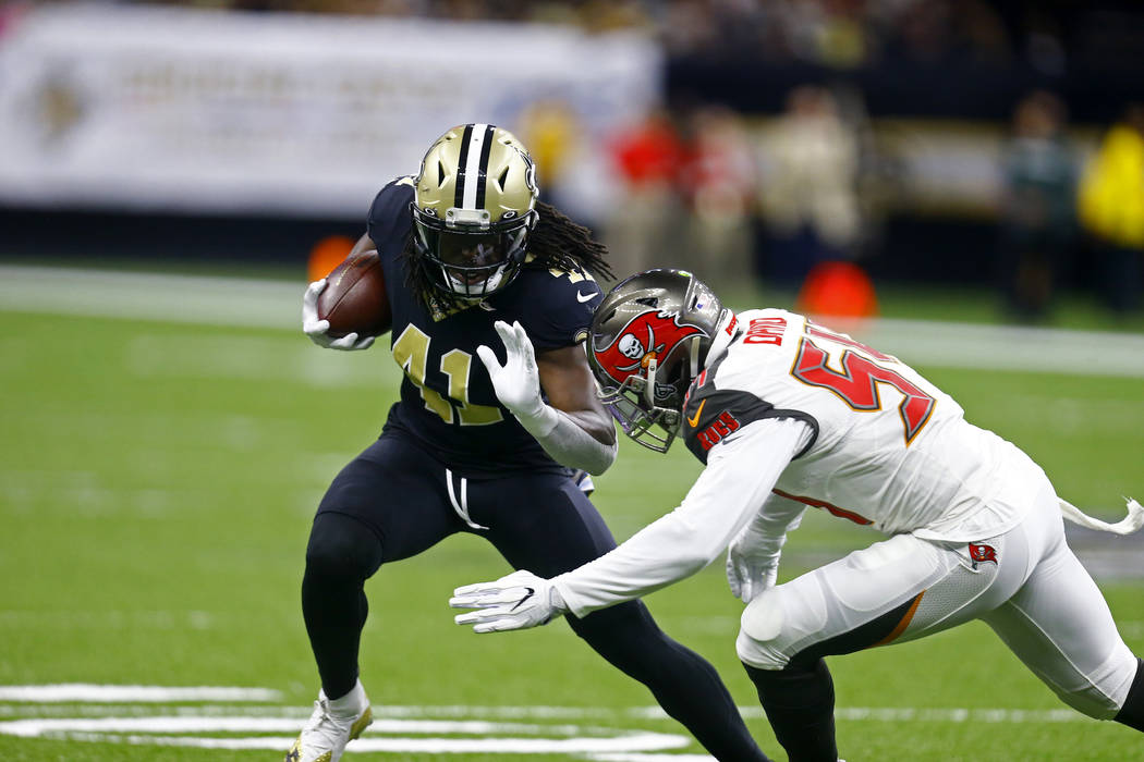 New Orleans Saints running back Alvin Kamara (41) carries against Tampa Bay Buccaneers outside ...