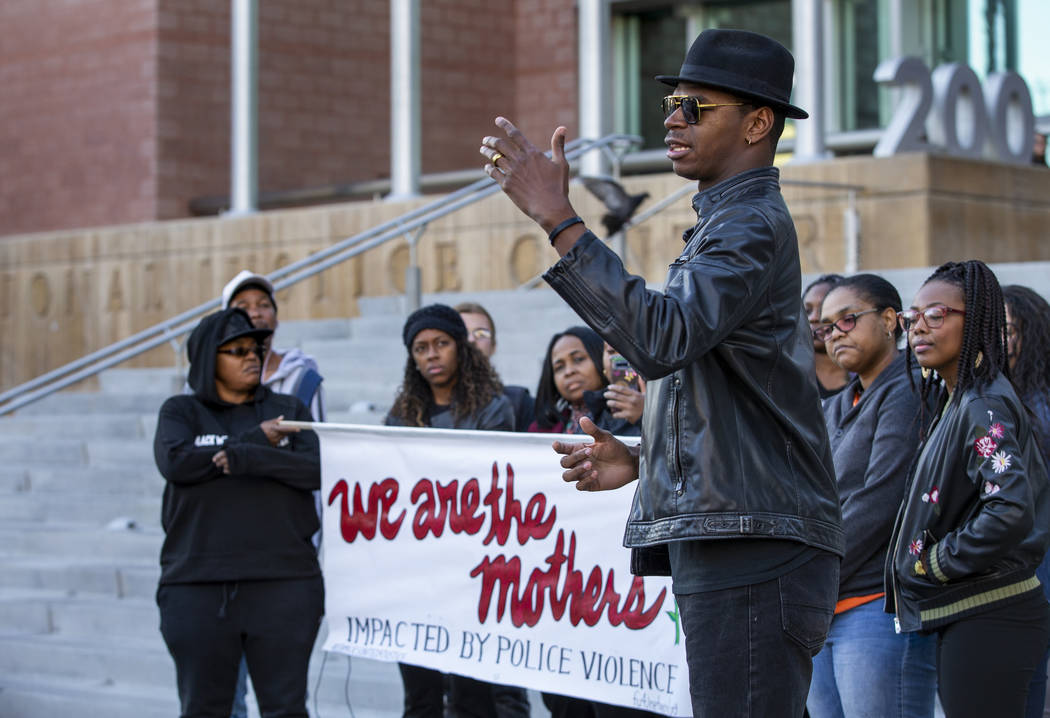 Rev. Stretch Sanders offers some words of strength during the National Day of Outrage rally out ...