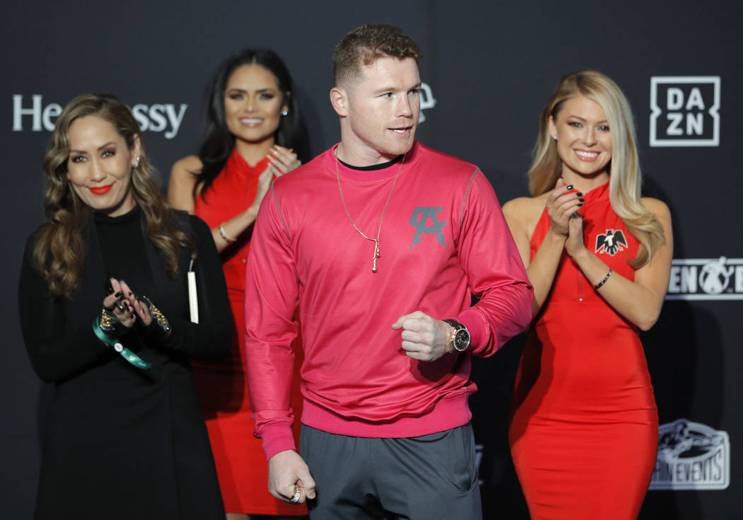 Canelo Alvarez motions to the crowd during a ceremonial arrival for an upcoming boxing match, T ...