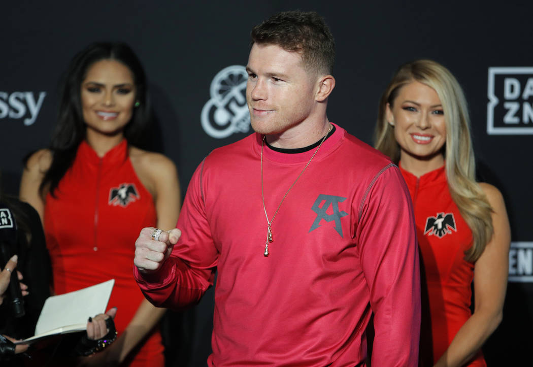 Canelo Alvarez motions to the crowd during a ceremonial arrival for an upcoming boxing match, T ...