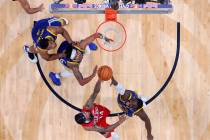 New Orleans Pelicans forward Brandon Ingram (14) and Golden State Warriors forward Draymond Gre ...