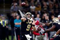 New Orleans Saints quarterback Drew Brees (9) passes in the first half of an NFL football game ...