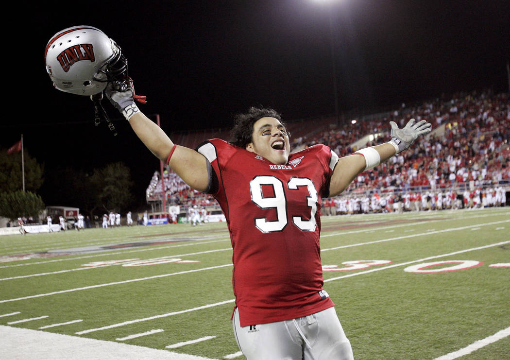 UNLV's Malo Taumua celebrates during the closing seconds of the Rebels' 27-0 shutout victory ag ...