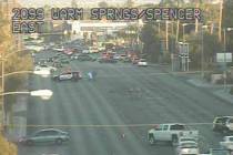 Police investigate a crash on the 2100 block of East Warm Springs Road in Las Vegas. (Nevada De ...