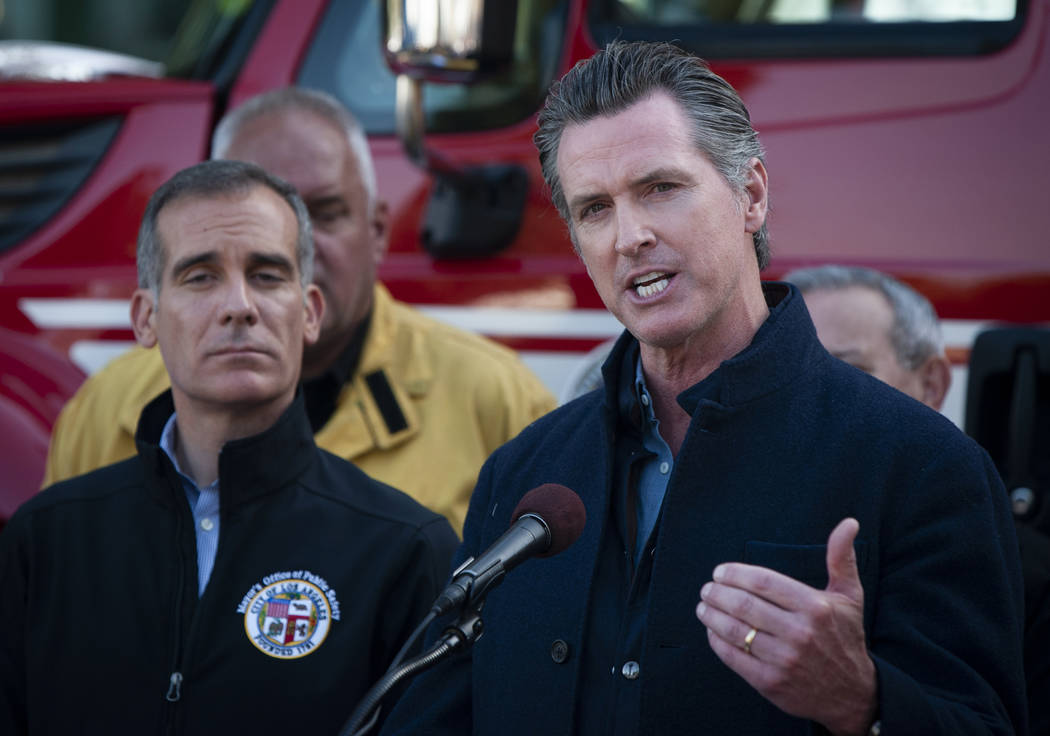 Governor of California Gavin Newsom speaks at a press conference for an update on the Getty Fir ...