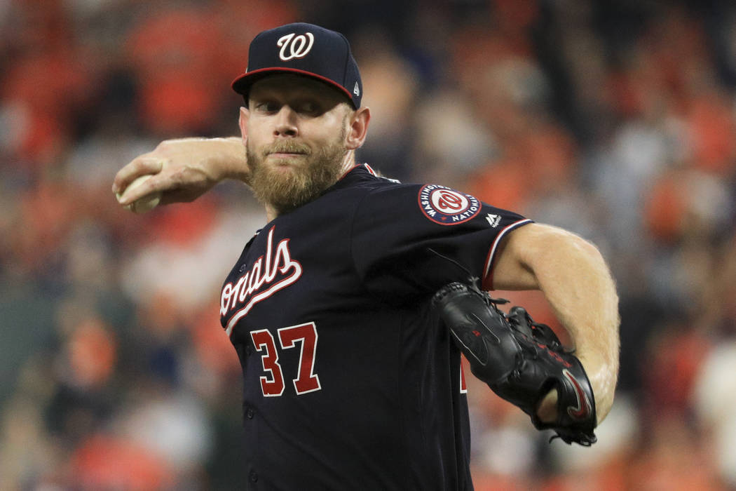 Washington Nationals starting pitcher Stephen Strasburg throws against the Houston Astros durin ...