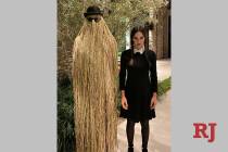 Golden Knights' Marc-Andre Fleury and his wife, Veronique Larosee Fleury, dressed as Cousin Itt ...