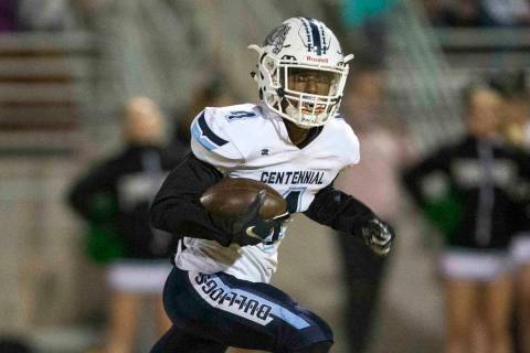 Centennial wide receiver Aaron Johnson (4) breaks away for a touchdown against Palo Verde durin ...