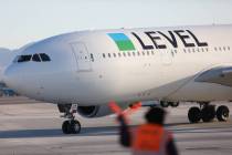 Level's first non-stop transatlantic flight between Paris and Las Vegas taxis to its gate at Mc ...