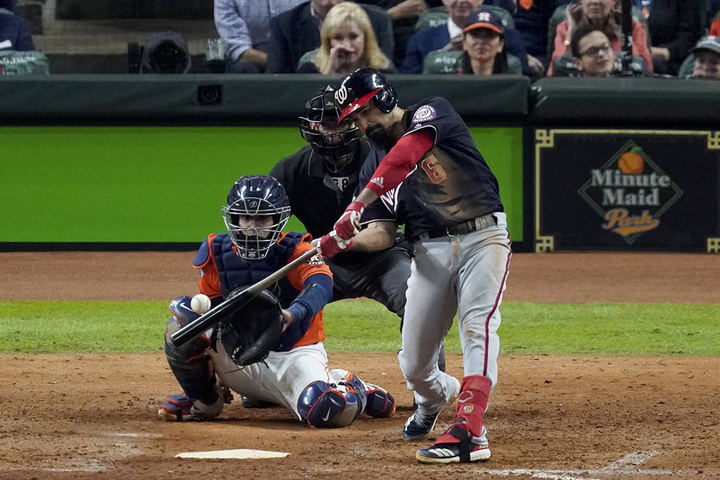 Washington Nationals' Anthony Rendon hits a home run against the Houston Astros during the seve ...