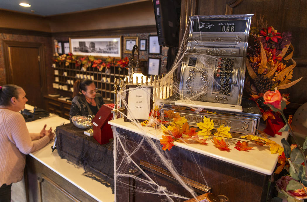 An old cash register and Halloween decorations near the front desk in the Mizpah Hotel in Tonop ...