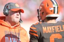 Cleveland Browns head coach Freddie Kitchens talks with quarterback Baker Mayfield (6) during a ...
