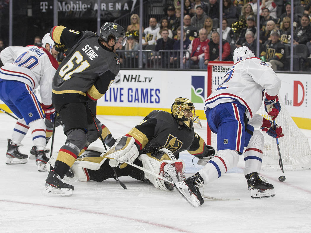 Vegas Golden Knights goaltender Marc-Andre Fleury (29) reaches to try and make a save against M ...