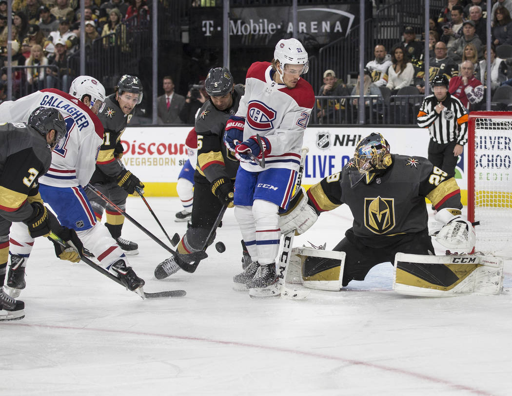 Vegas Golden Knights goaltender Marc-Andre Fleury (29) makes a save in traffic against Montreal ...