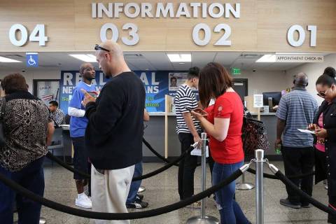 Customers wait in line the DMV at Sahara office on Friday, May 10, 2019, in Las Vegas. (Bizuaye ...