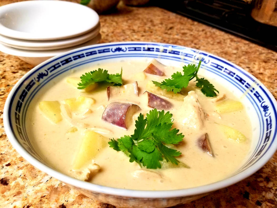 Yellow chicken curry with potatoes is among the dishes prepared by Klaus Bremer. (Natalie Burt)