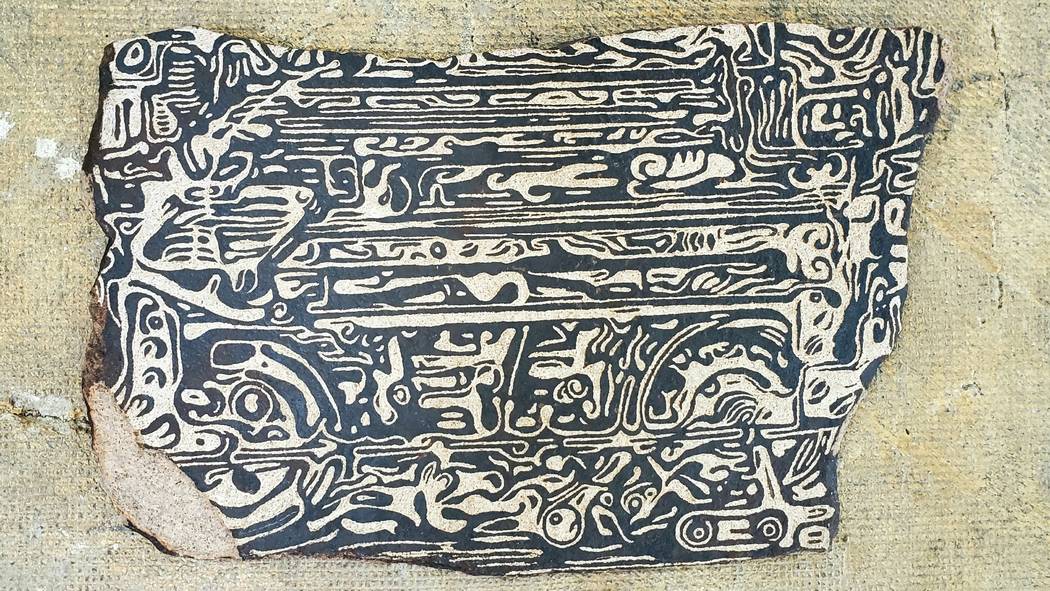 A contemporary petroglyph by Thomas Larson, entitled "Machinery." (Core Contemporary)