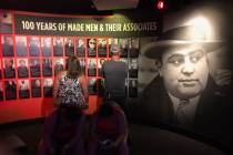 A wall of crime figures features Al Capone and others of his era. (Herb Jaffe)