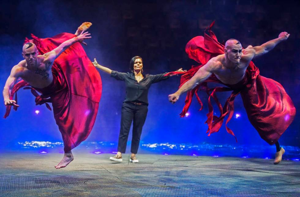 Resident choreographer Danita Eldridge, middle, gives direction to Reggie Morlen, left, and A.J ...