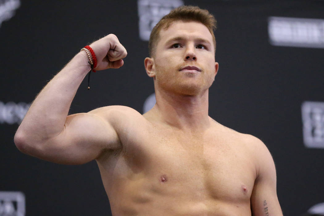 Saul "Canelo" Alvarez poses during his weigh-in event at the MGM Grand Garden Arena i ...