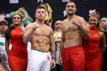 Saul "Canelo" Alvarez, left, and Sergey Kovalev pose during a weigh-in event at the M ...