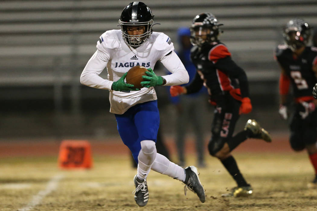 Desert Pines Deandre Moore (2) makes a catch for a touchdown against Las Vegas during the secon ...