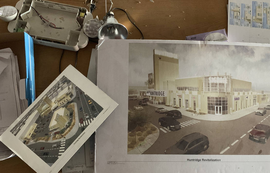 Renderings of a remodeled Huntridge Theater are scattered across a table inside the lobby of t ...