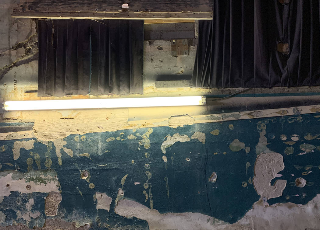 Chipped paint and plaster covers the walls inside the historic Huntridge Theater on Thursday, O ...