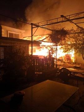 Arriving Las Vegas Fire Department firefighters reported a residence fully involved in flames w ...