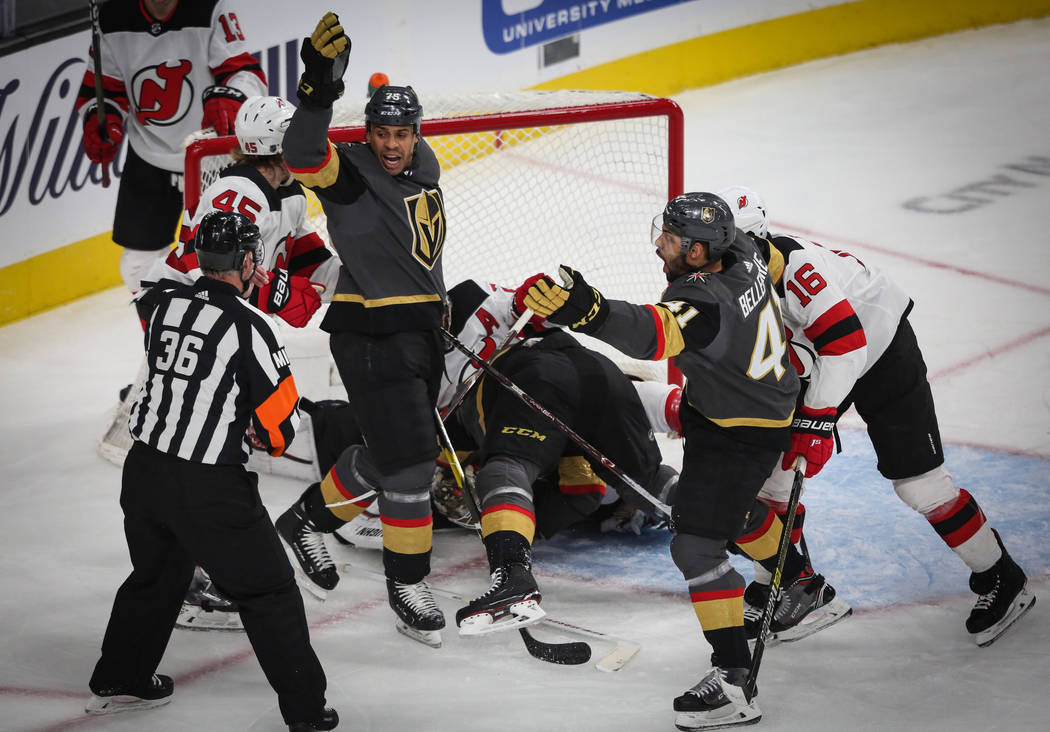 Vegas Golden Knights right wing Ryan Reaves (75) and Vegas Golden Knights center Pierre-Edouard ...