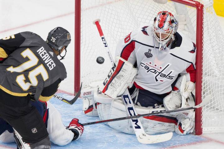Golden Knights right wing Ryan Reaves (75) scores a third-period goal against Capitals goaltend ...