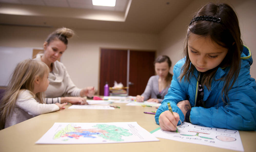 Daria Alulema, 8, during a "Fun to Play" session at Alexander Library in North Las Ve ...