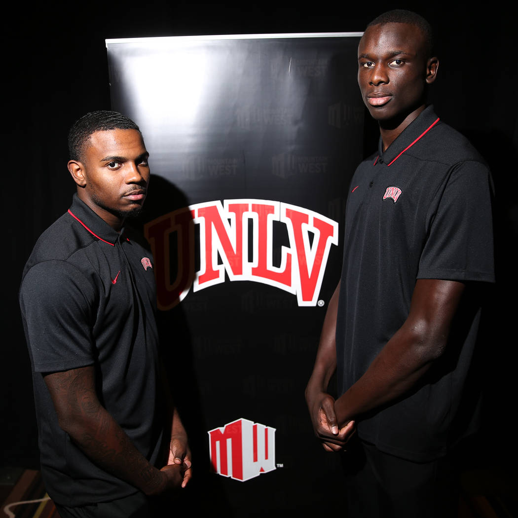 UNLV's Amauri Hardy, left, and Cheikh Mbacke Diong, participate during the Mountain West basket ...