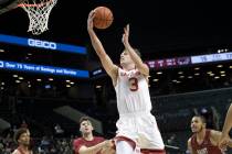 Davidson guard Jon Axel Gudmundsson (3) goes to the basket during the first half of the team's ...