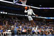 Memphis freshman center James Wiseman dunks the ball during Memphis Madness in Memphis, Tenn. o ...