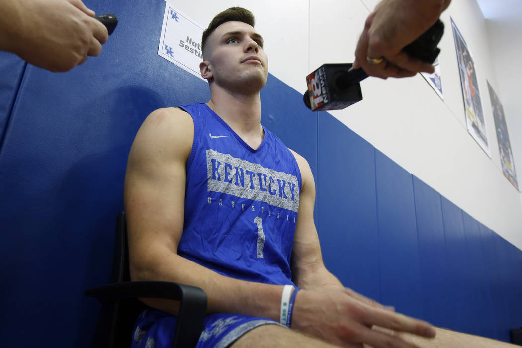 Kentucky's Nate Sestina listens to a question during the university's NCAA college basketball m ...