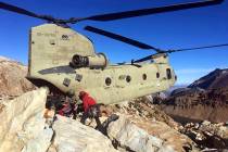 Crews work to recover the bodies of two hikers who died on Red Slate Mountain in California's e ...