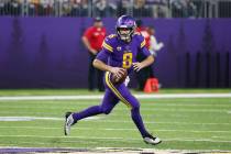 Minnesota Vikings quarterback Kirk Cousins (8) throws a pass during the second half of an NFL f ...