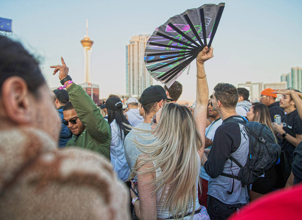 Fans dance at the Roll the Dice stage during the Day N Vegas music festival on Friday, Nov. 1, ...