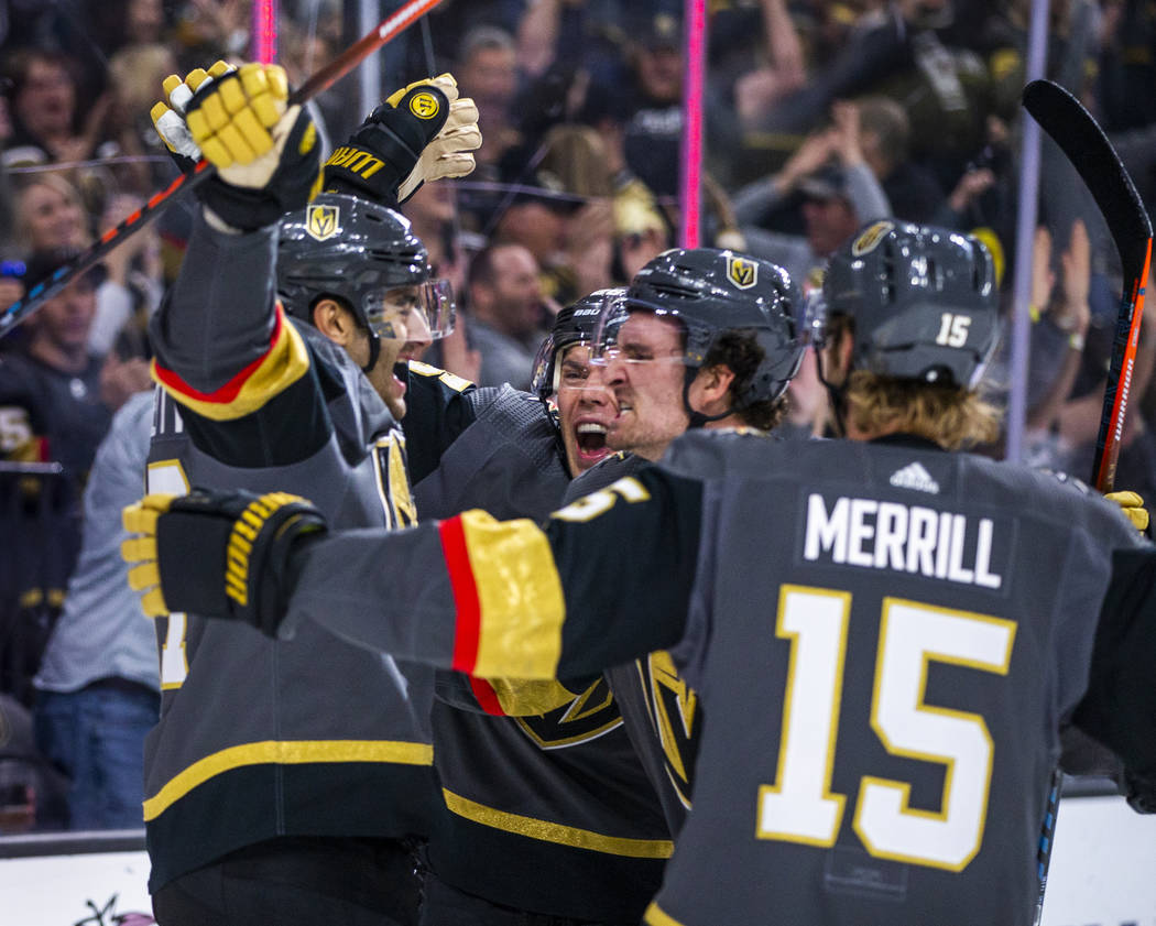 Vegas Golden Knights left wing Max Pacioretty (67, left) celebrates a goal with teammates over ...