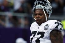 Oakland Raiders offensive tackle Trent Brown (77) walks off the field following warm ups prior ...