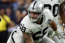 Oakland Raiders offensive tackle Andre James (68) prepares to hike the football after replacing ...