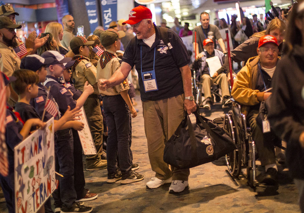 Don Furlong, a veteran of the U.S. Air Force, greets supporters after visiting the veteran memo ...