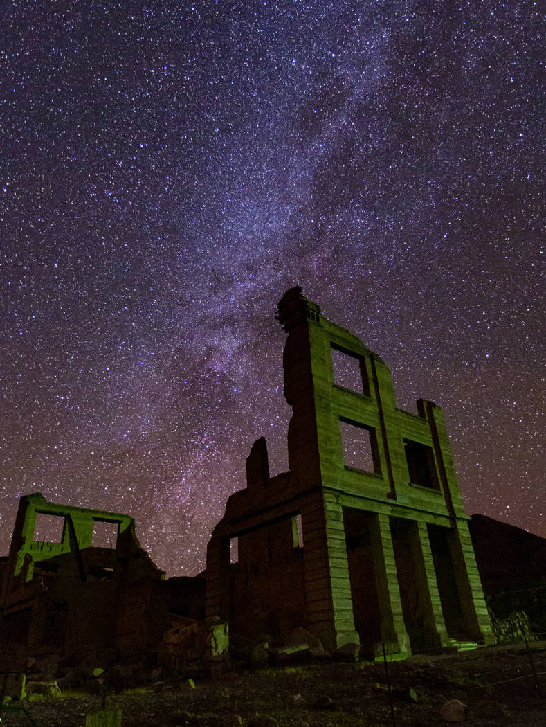 A view of the night sky over the Cook Bank building in Rhyolite on Friday, Nov. 22, 2019. (Chas ...