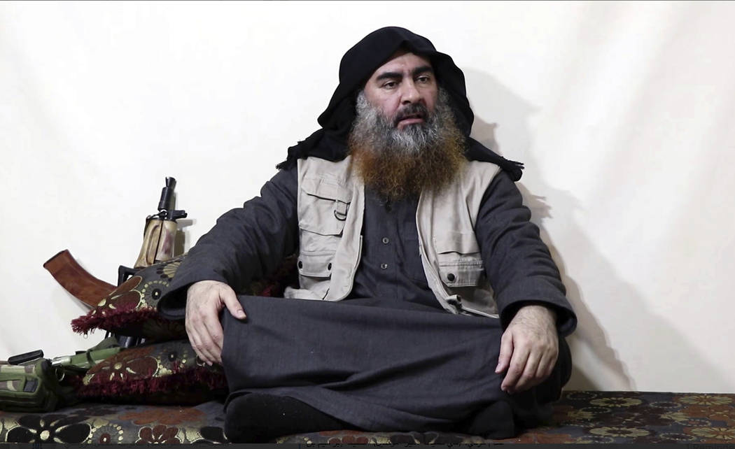 FILE - This file image made from video posted on a militant website April 29, 2019, purports to ...