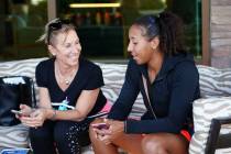 Rasheeda McAdoo (right) and her mom, Patrizia, chat after her match at the Henderson Tennis Ope ...