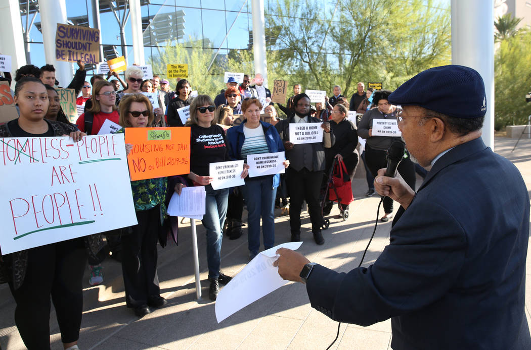 Rev. Leonard Jackson speaks outside Las Vegas City Hall during a protest against the city counc ...