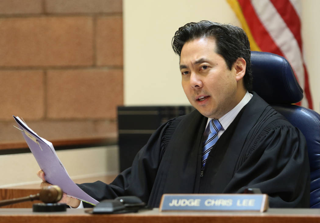 Justice of the Peace Chris Lee presides over a case in North Las Vegas Justice Court on May 21, ...