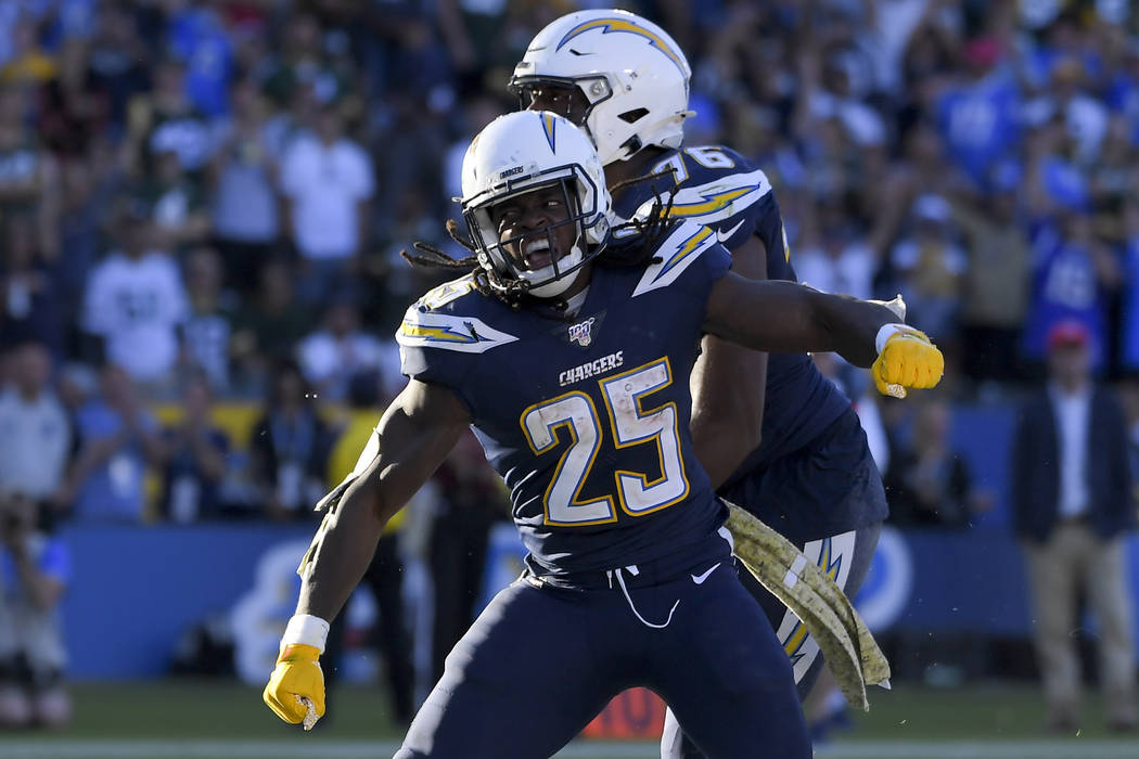 Los Angeles Chargers running back Melvin Gordon celebrates after scoring against the Green Bay ...