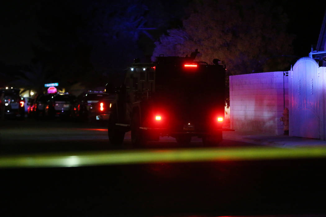 Las Vegas police officers respond Tuesday, Nov. 5, 2019, to a fatal shooting near Jones Bouleva ...